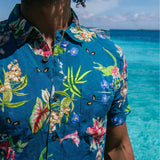 Navy button up with hand drawn pink dolphins, jungle animals and flowers print.