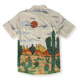 Cream short sleeve button up shirt featuring desert landscape and cactus print
