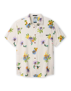 Front view of the Baja Llama Passion Project Nighthawk™ relaxed fit button-up shirt featuring a cream-colored fabric with a vibrant floral and tropical hummingbird print.