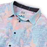 Multicolored floral reverse print button up shirt, with signature size zip pocket.