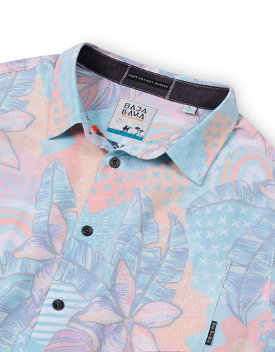 Multicolored floral reverse print button up shirt, with signature size zip pocket.