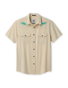 Beige short-sleeve shirt with embroidered lizard designs on a white background