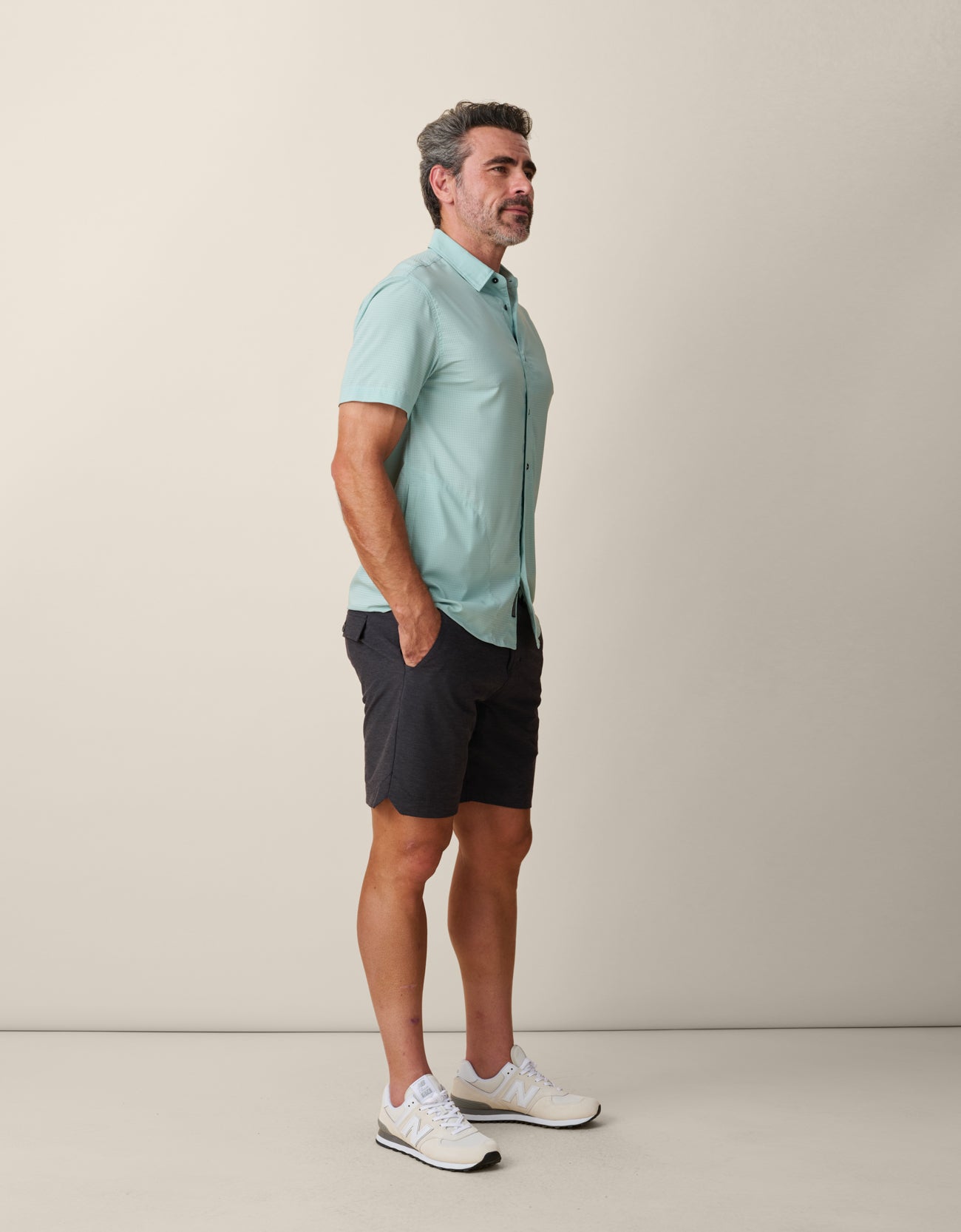 Model wearing Sage Green shirt – casual performance for heat and movement