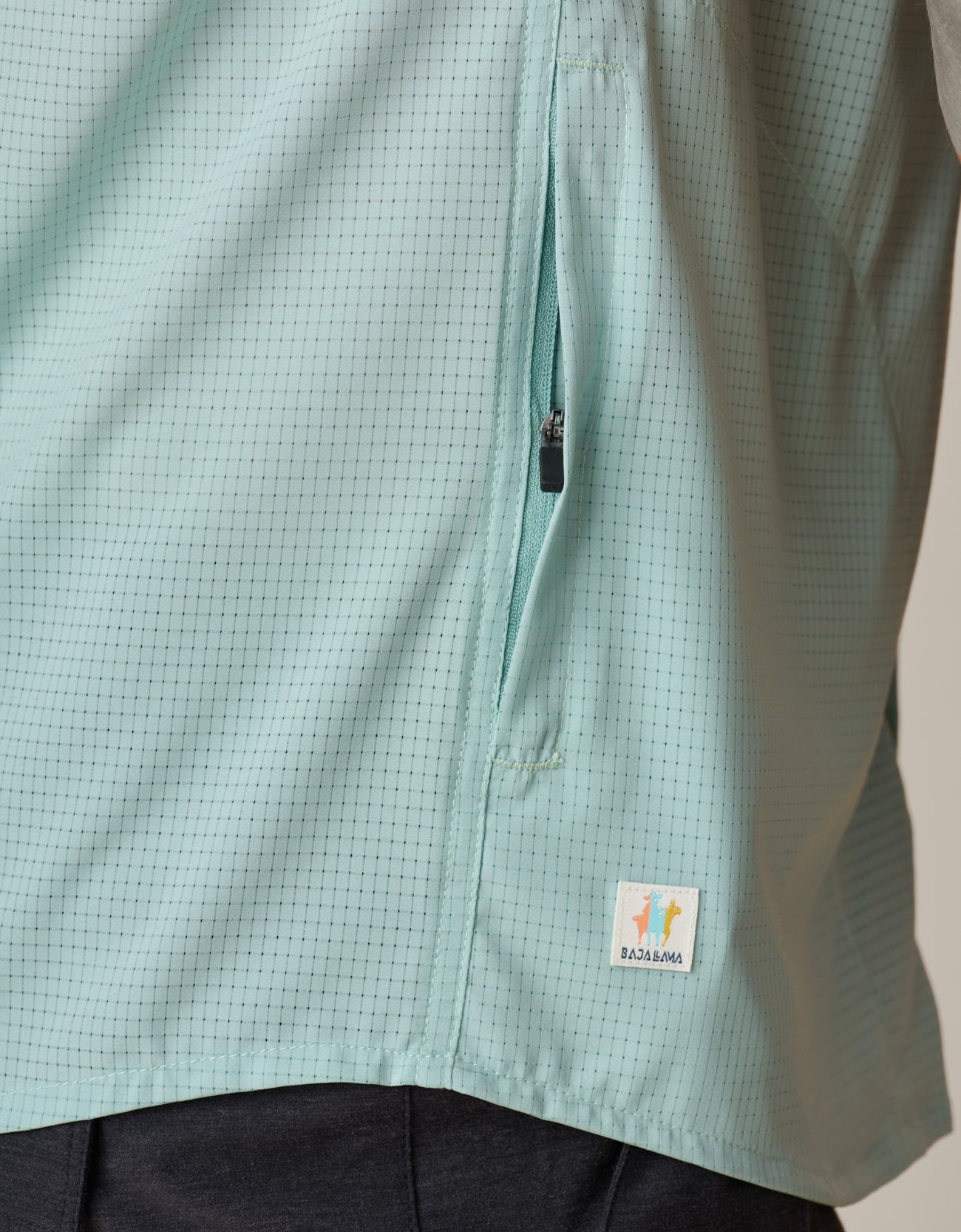 Mojave fabric detail – breathable, stretch tech in soft green