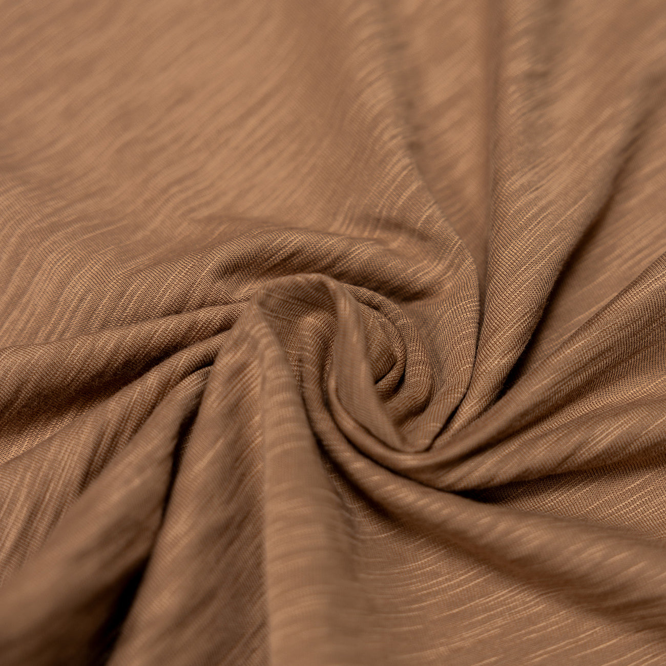 Baja Llama Solid Scorched Brown Pima Slub Tee material close-up showing soft slub cotton texture
