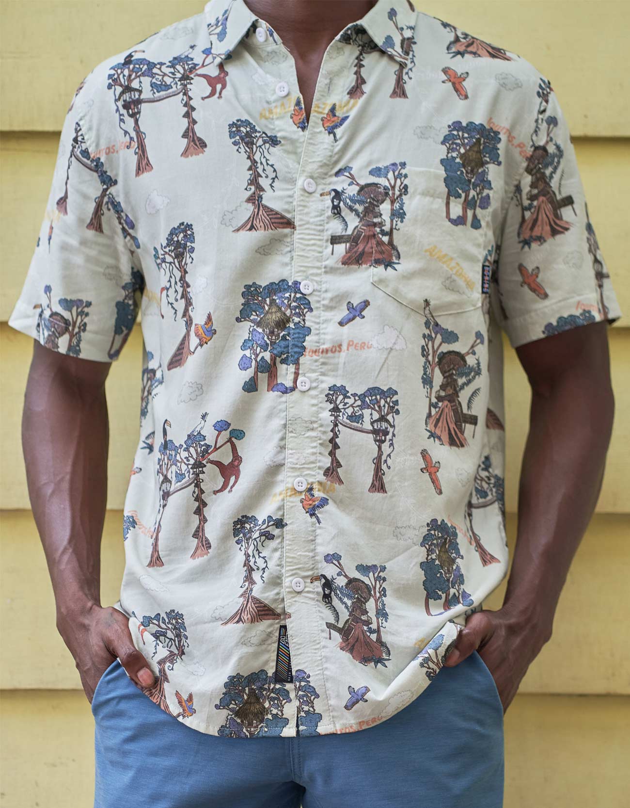 Amazon rainforest treehouse print shirt depicting canopy life in Peru's jungle