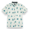 Tan button up shirt with various cactus print in turquoise