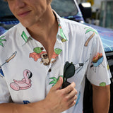 Close-up of the Baja Llama The BBQ Shirt white relaxed-fit button-up showing the playful summer cookout print, chest pocket, and sunglasses