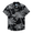 Front view of THE CANOPIES ARE ALIVE - NIGHTHAWK™ RELAXED FIT BUTTON UP from Baja Llama, a black short-sleeve shirt featuring an intricate white hand-drawn print of palm trees and monkeys.