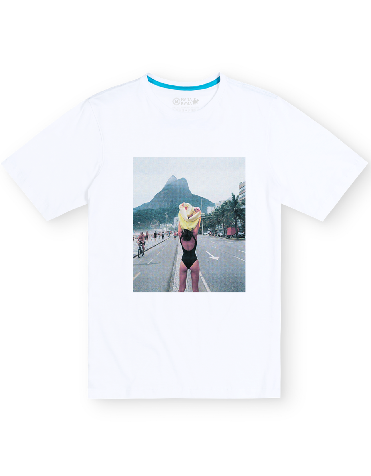 Front flat-lay view of the Baja Llama The Girl In Ipanema Primo Graphic Tee, featuring a white short-sleeve t-shirt with a large rectangular photographic print on the center chest depicting a woman in a swimsuit near Ipanema Beach.