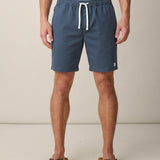 Man wearing Baja Llama dark slate stretch cotton shorts with white drawstring waist