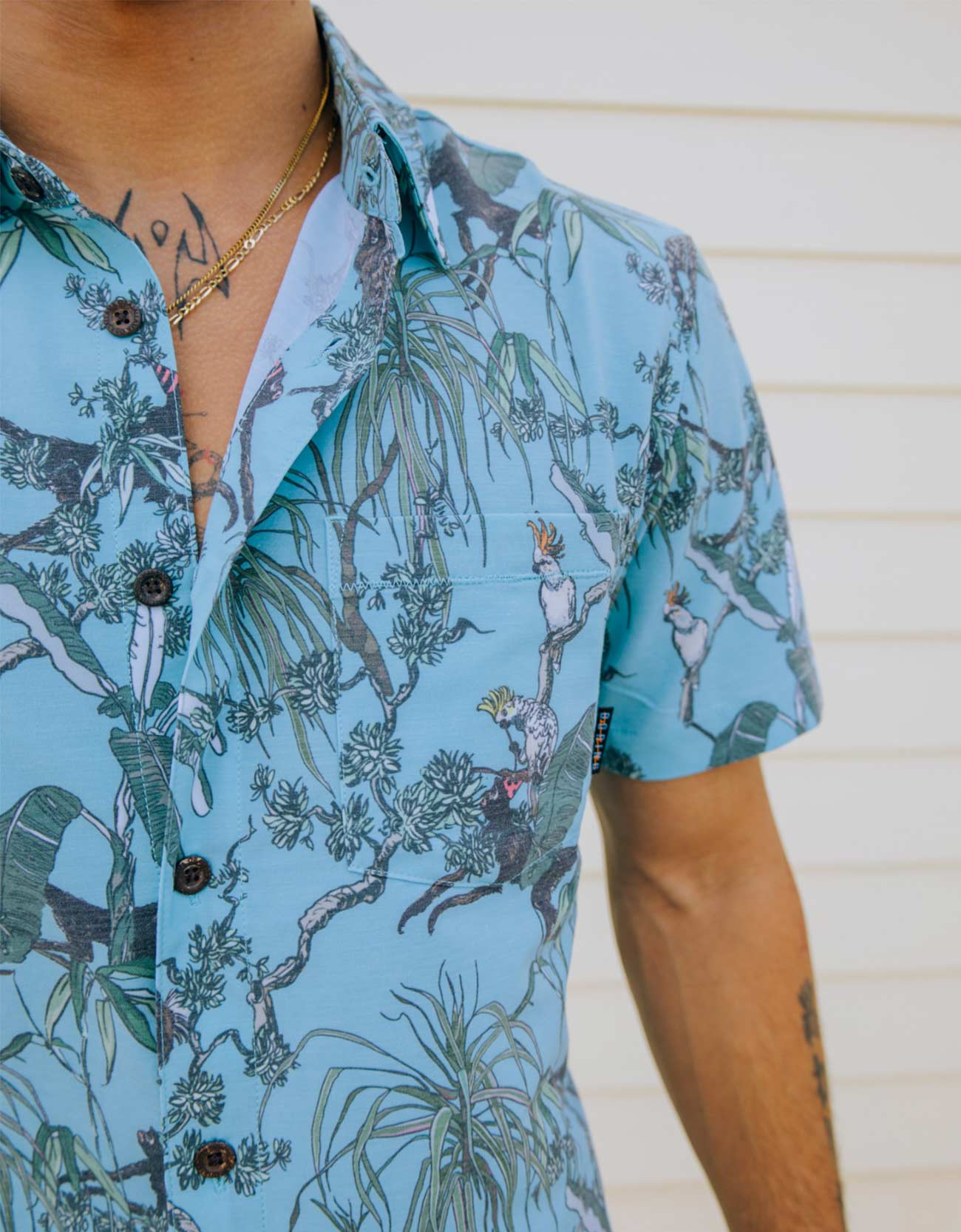 Baja Llama green monkey and bird party print Recycled Poly stretch short sleeve button up shirt
