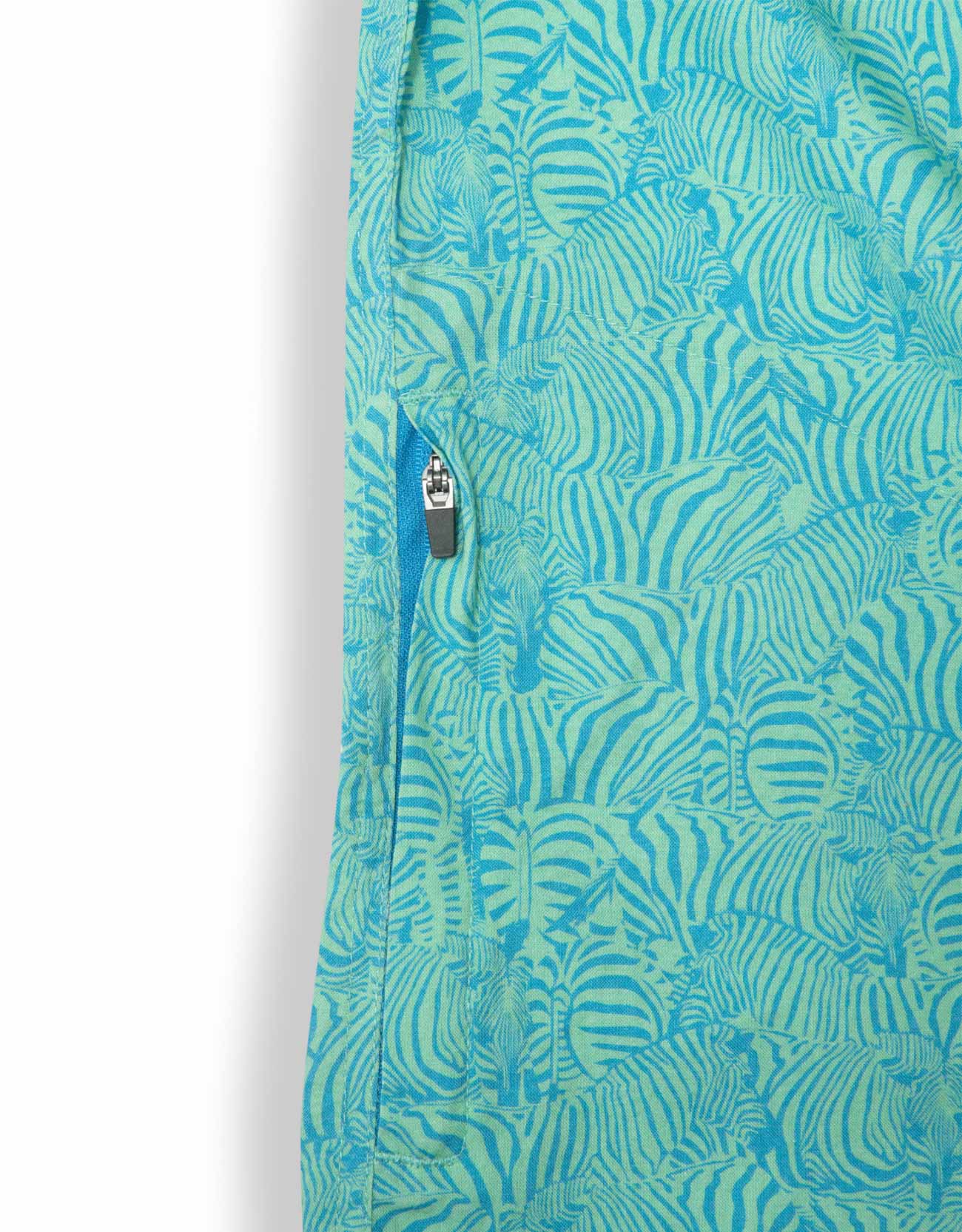 Green and turquoise button up with subtle zebra stripe print and side pocket