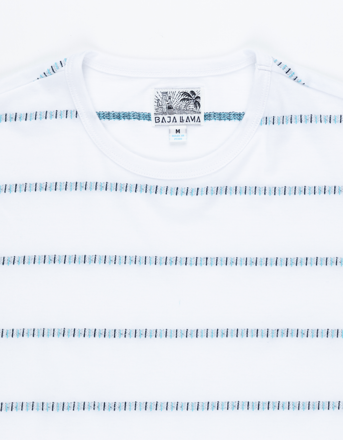 White t-shirt with blue pattern and 'Baja Llama' tag on a white background